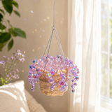 Purple beaded hanging plant in a cozy reading nook